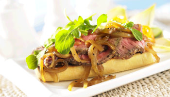 Grilled Beef Steak Sandwich with Melted Onions