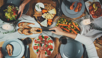 Top view of celebration, group of friends dinning, family celebration concept, friends enjoying healthy food at home, Happiness Friendship