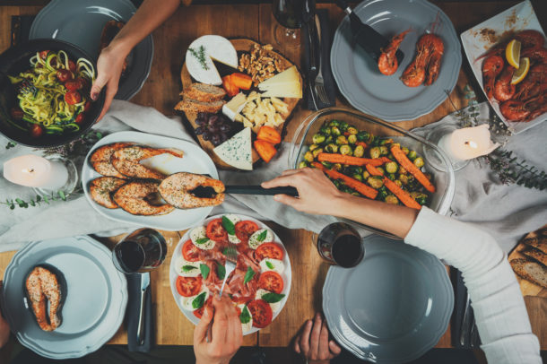 Top view of celebration, group of friends dinning, family celebration concept, friends enjoying healthy food at home, Happiness Friendship